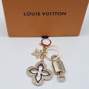 Authentic Louis Vuitton Gold Lock & Box w/ Unbranded Clover Bagcharm 121825